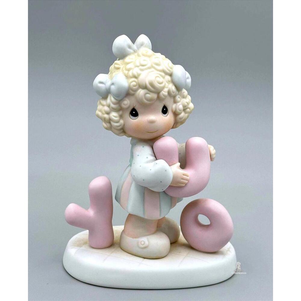 Precious Moments Figurine - Girl Holding Pink Letters 'XOX'